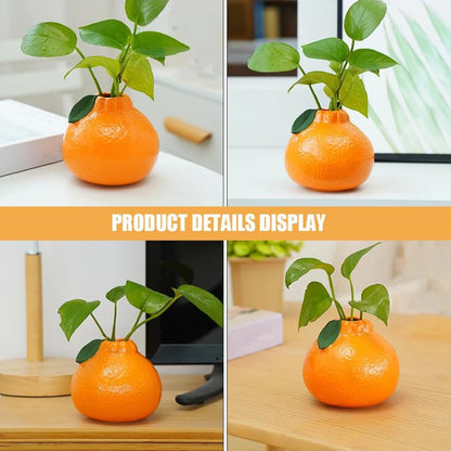 Ceramic fruit vase in orange color displayed with fresh flower stems