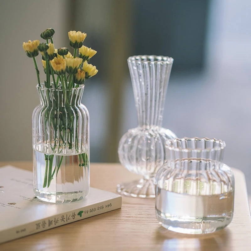 Striped glass vase in size L with fresh flowers on dining table