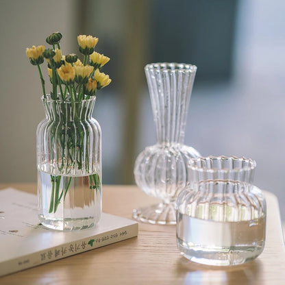 Striped glass vase in size L with fresh flowers on dining table