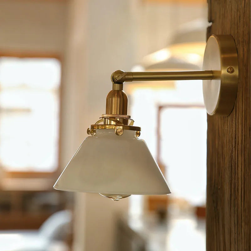 glass bathroom wall sconce, front view on white background