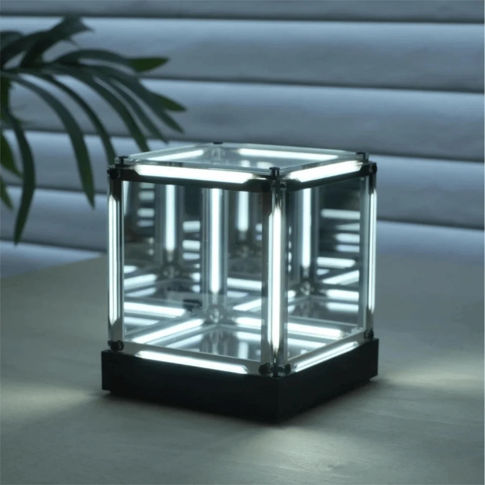 Maglev cube LED lamp close-up showing magnetic levitation mechanism detail