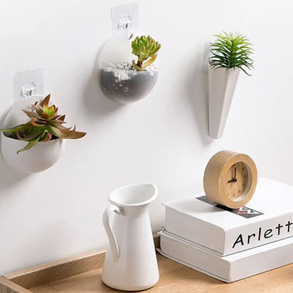 White semicircle wall hanging acrylic planter in Scandi minimalist hallway