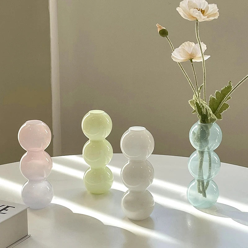 Glass mushroom flower pot styled in botanical home interior