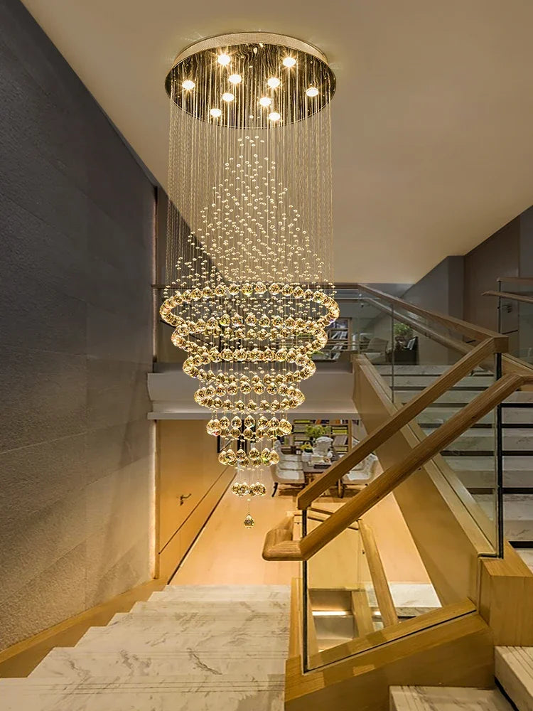 Black metal starry chandelier with crystal detail for a tall stairwell void