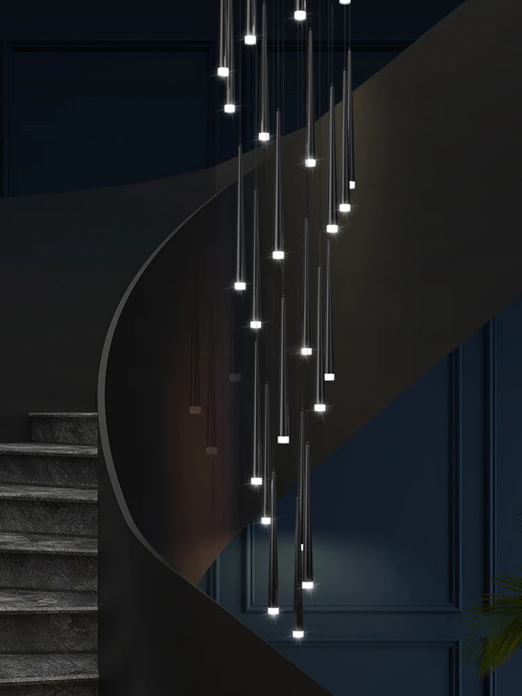 Black lamp body chandelier lit in warm light down a duplex void