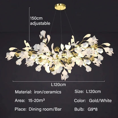 Ceramic ginkgo leaves lit with warm 3000K light on a cord pendant frame