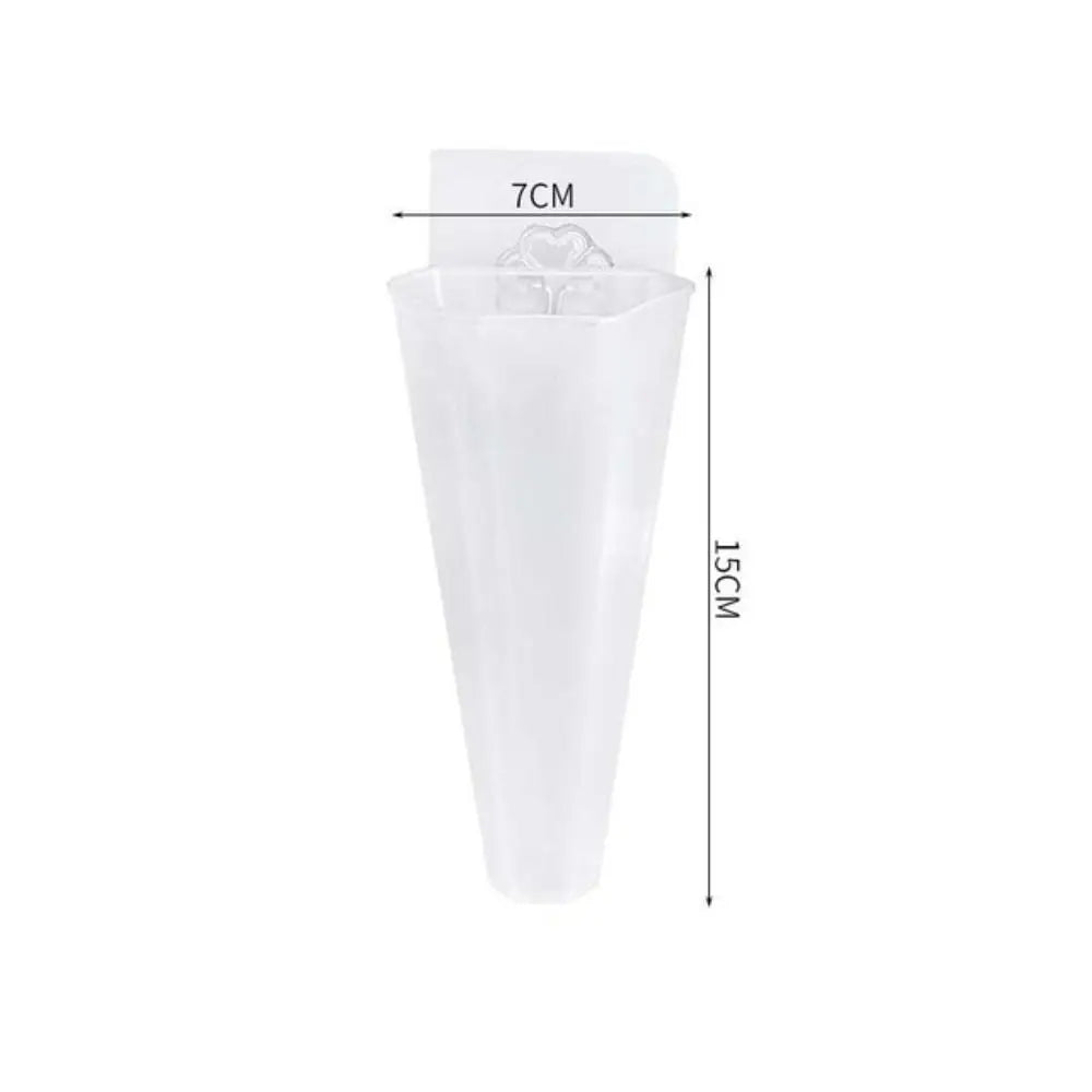 White conical acrylic wall planter with air plant for modern wall botanical display