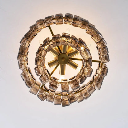 Golden metal glass chandelier with up and down light for a restaurant table