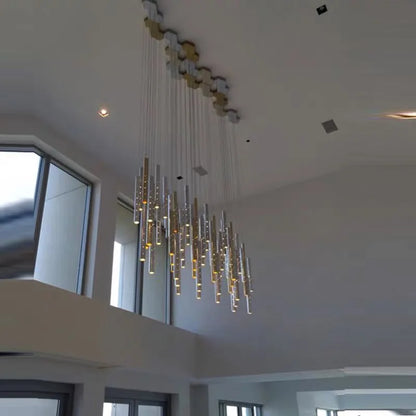 Twelve head tube chandelier in two sets suspended from a shared canopy