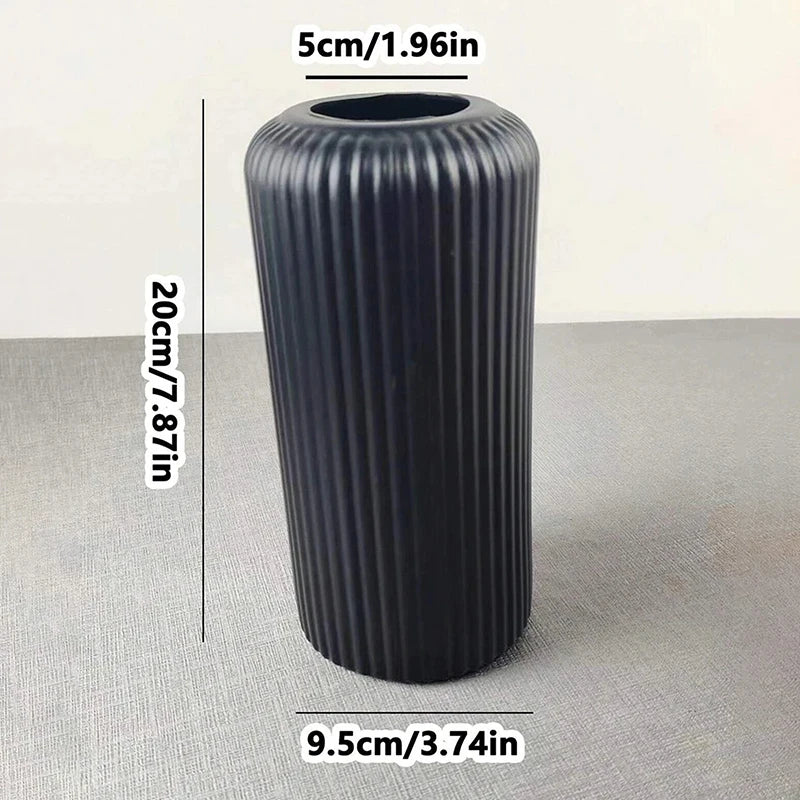 Ceramic-look plastic flower vase showing clean stripe pattern detail