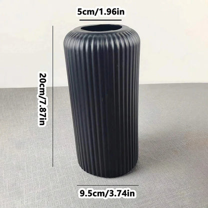 Ceramic-look plastic flower vase showing clean stripe pattern detail