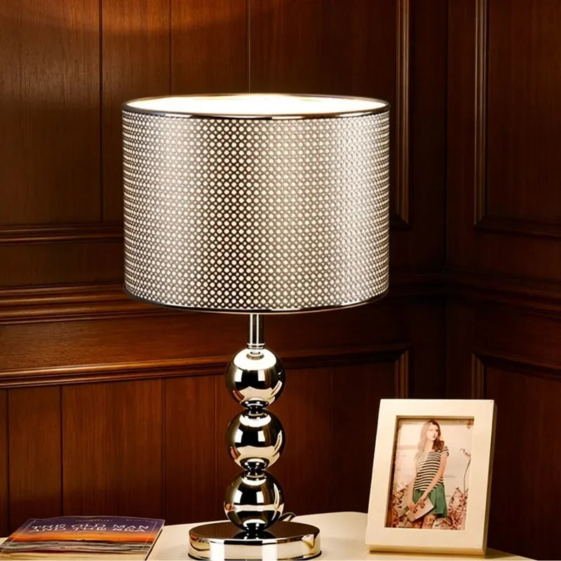 Black Nordic desk lamp with push-button switch on study table