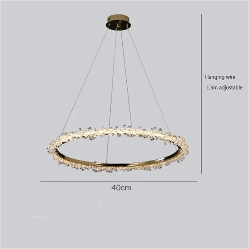 Stacked crystal ring chandelier forming a luminous vertical column