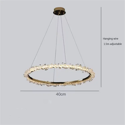 Stacked crystal ring chandelier forming a luminous vertical column