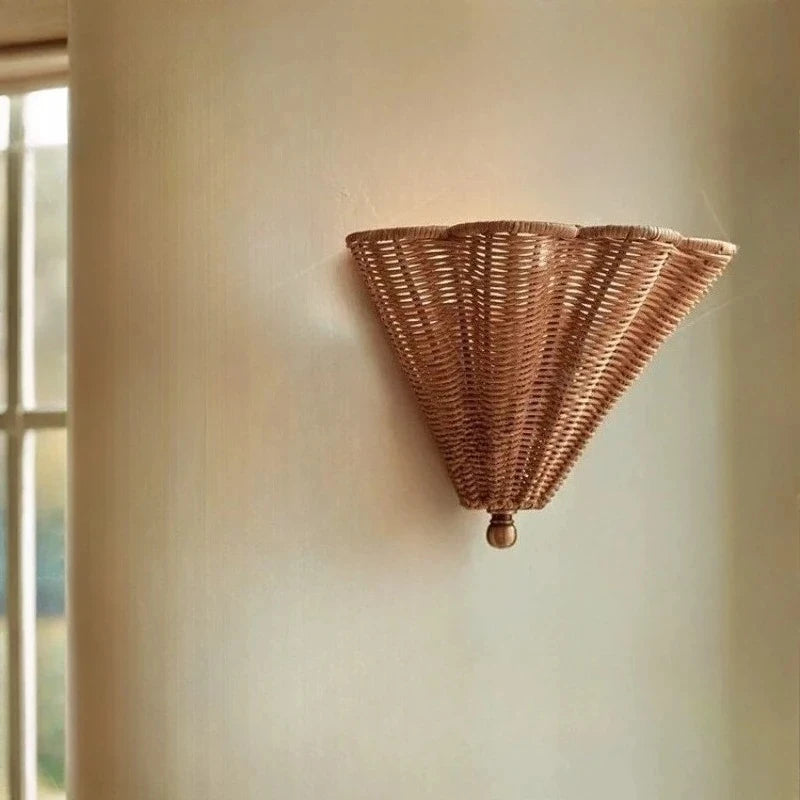 rattan wall sconce, front view on white background