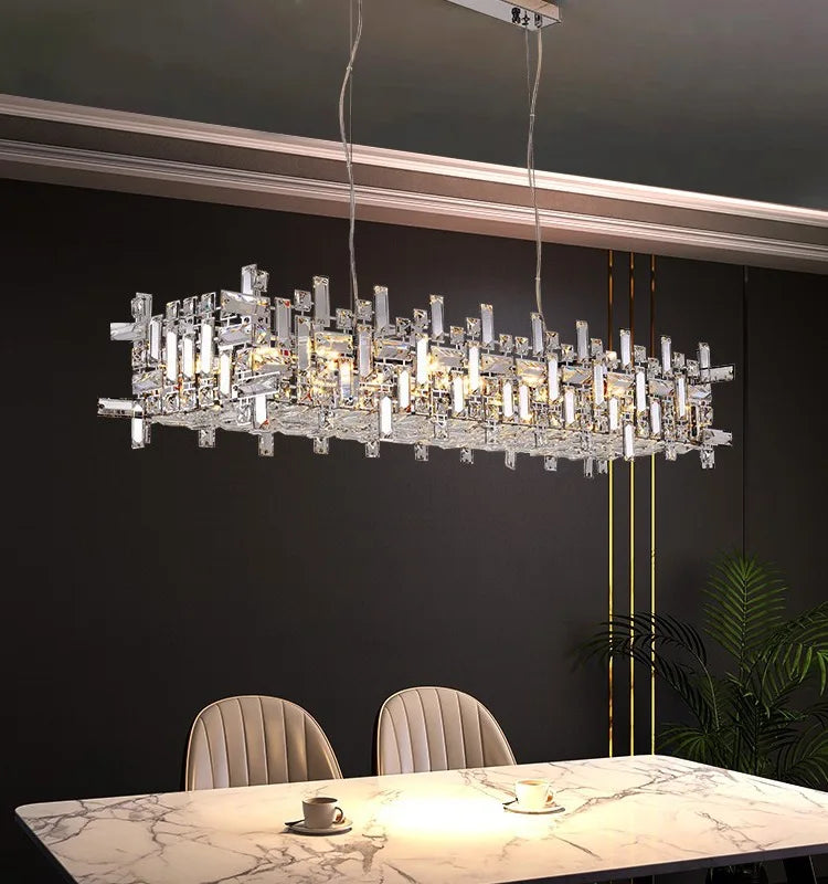 Linear crystal chandelier, 47.2 in long, lit in warm 3000K light