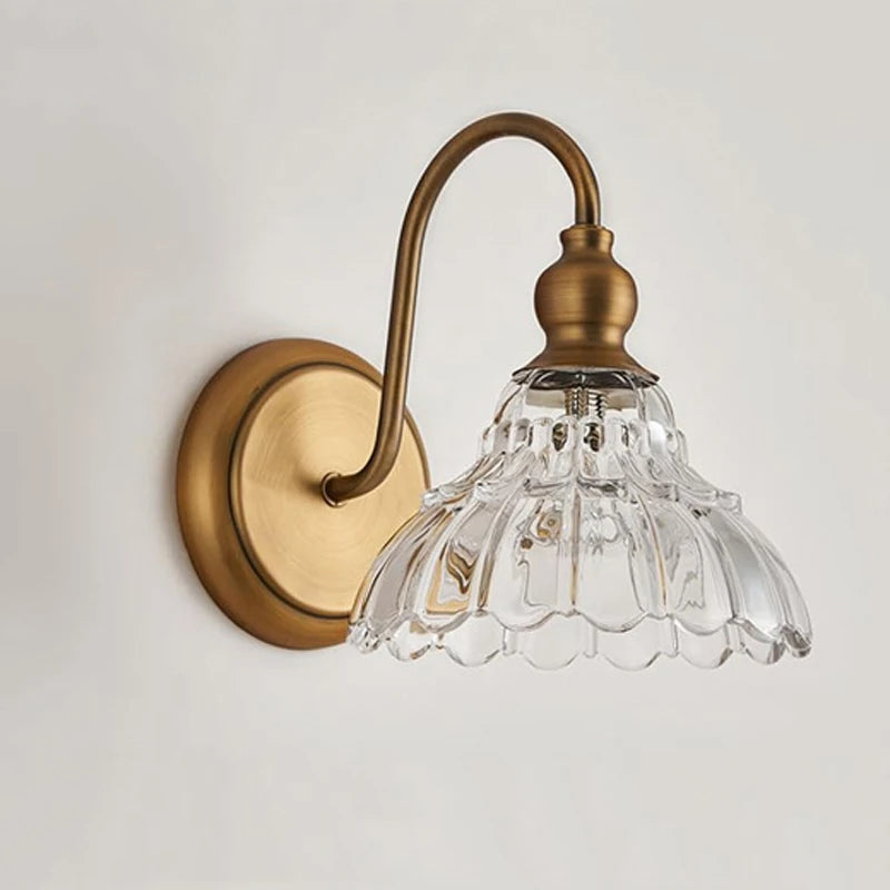 gold crystal bathroom wall sconce, detail view of fixture base and arm