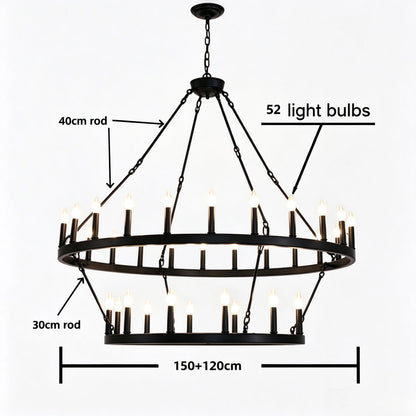Iron candle chandelier shown lit in warm upward E14 light