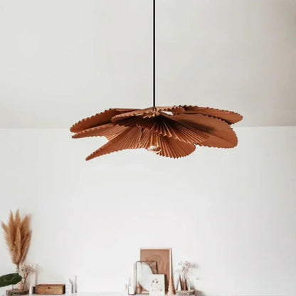Pleated paper chandelier shown in a neutral toned interior