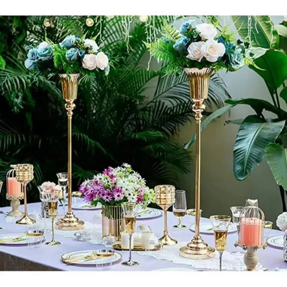 Three silver metal flower stand vases in S M and L sizes arranged as decorative collection