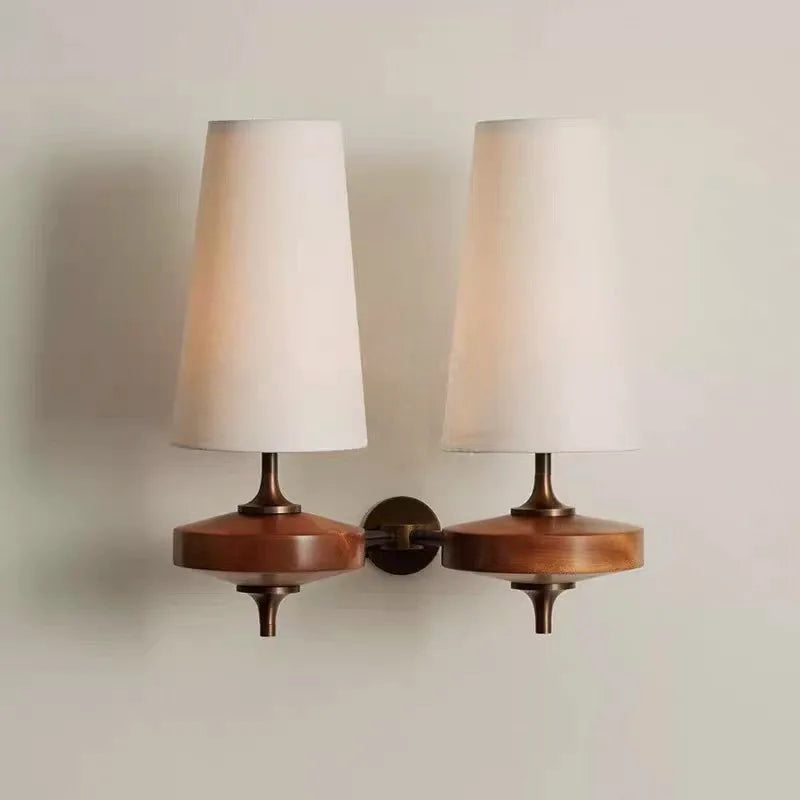 fabric shade wall sconce, front view on white background