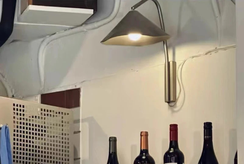 wall sconce, installed in a room interior setting