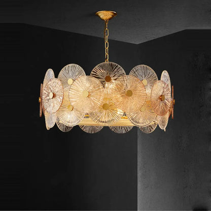 Gold lotus leaf chandelier with frosted glass discs on steel