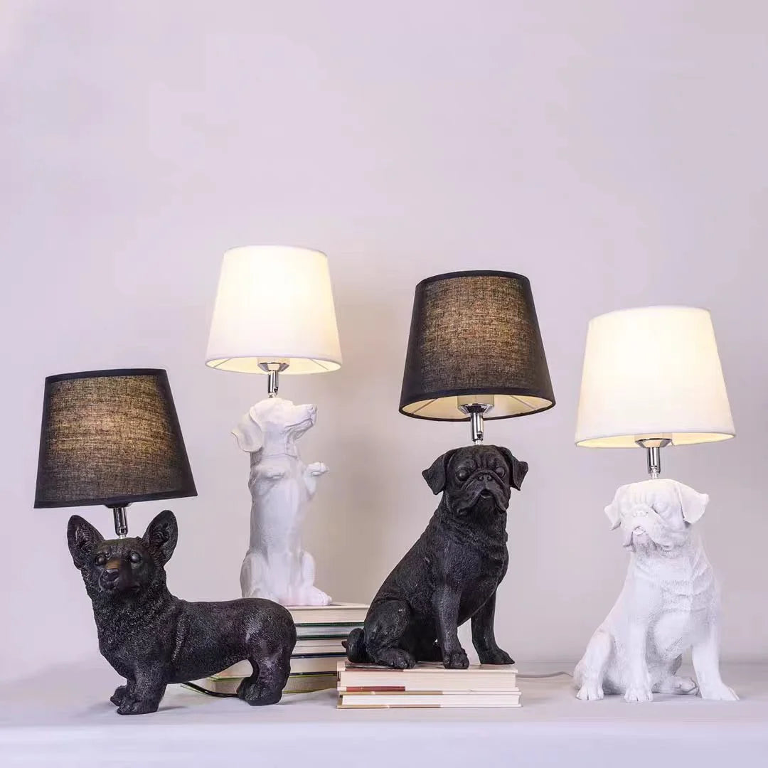 Two puppy dog lamps white and black variants side by side comparison