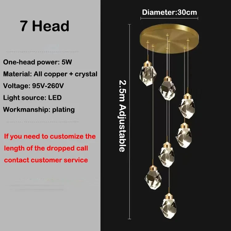 Thirty head crystal staircase chandelier arranged as a tall lit column