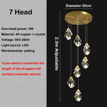 Thirty head crystal staircase chandelier arranged as a tall lit column