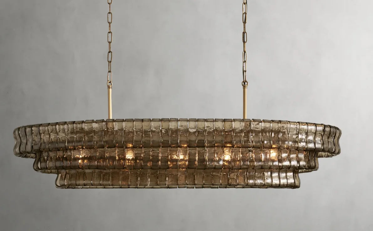 Modern steel chandelier with clear glass shades facing downward