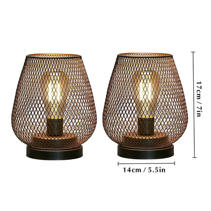 Cordless LED metal cage table lamp in indoor living room arrangement
