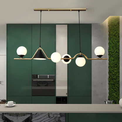 Transparent glass shade detail on a contemporary alloy chandelier bar