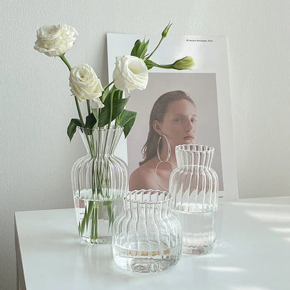 Close-up of vertical retro stripe pattern on mini glass flower vase