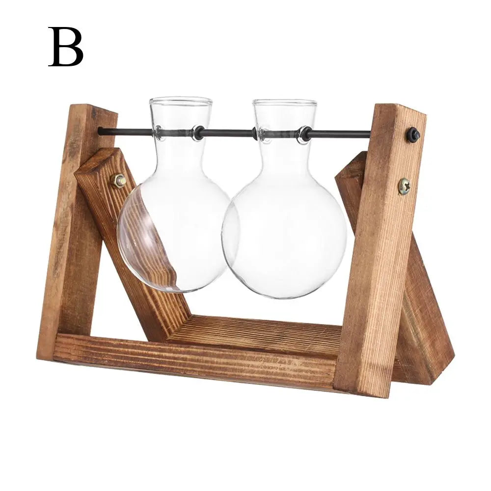 Natural wood and glass terrarium planter styled with fresh herb cuttings