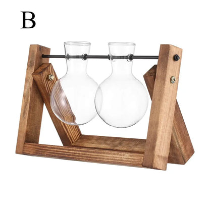 Natural wood and glass terrarium planter styled with fresh herb cuttings