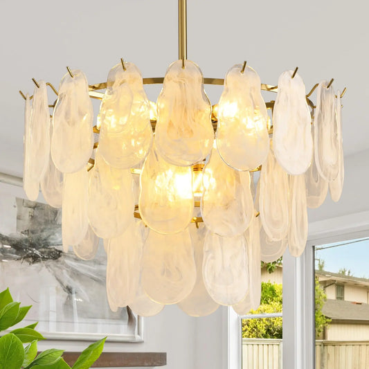 Tiered lantern glass chandelier with stacked shades on a gold frame