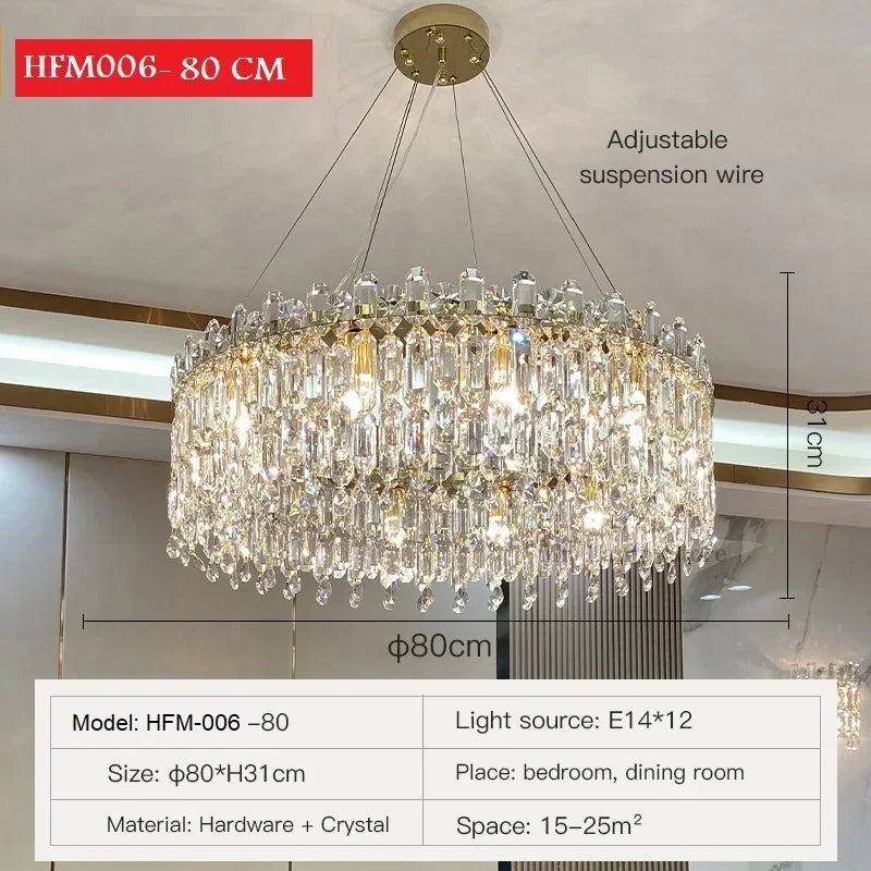 Matching crystal wall light in gold from the brushed steel chandelier range