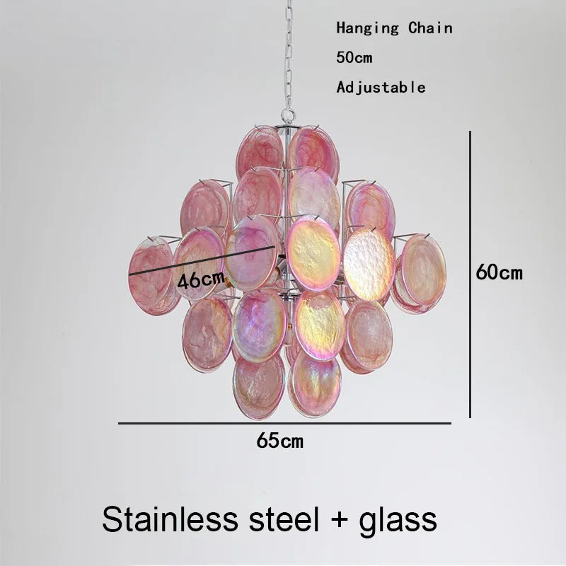 Orange glass disc chandelier seen from below with up and down light