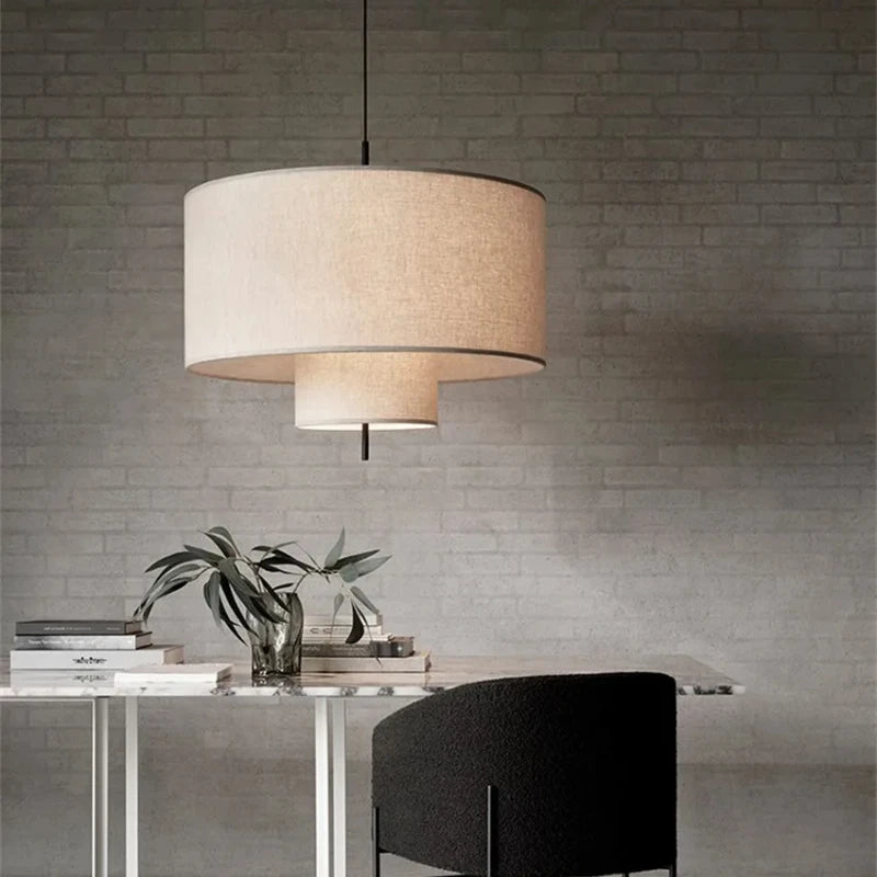 Hand knitted beige chandelier on an iron frame with warm white light
