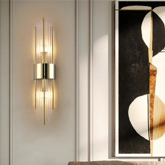 gold stainless steel wall sconce, front view on white background