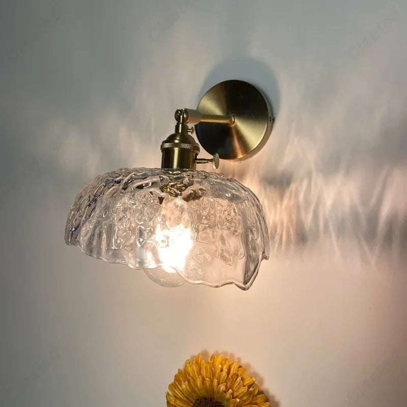 glass wall sconce, installed in a room interior setting