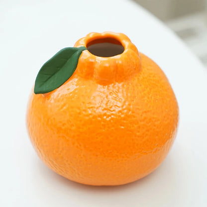 Ceramic fruit shaped decorative vase styled in cottagecore home interior
