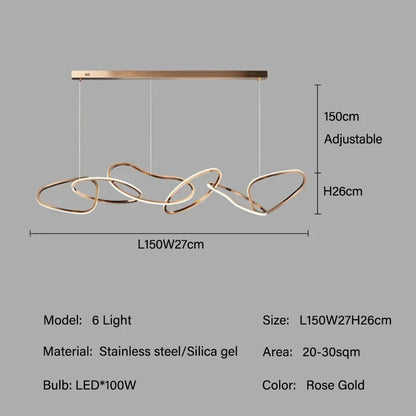 Burnished rose gold chandelier discs set side by side on a ceiling plate
