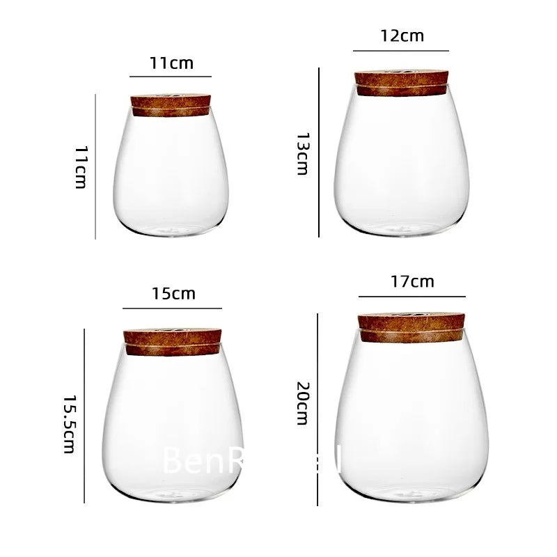 Small glass landscape bottle with cork lid on wooden Zen desktop
