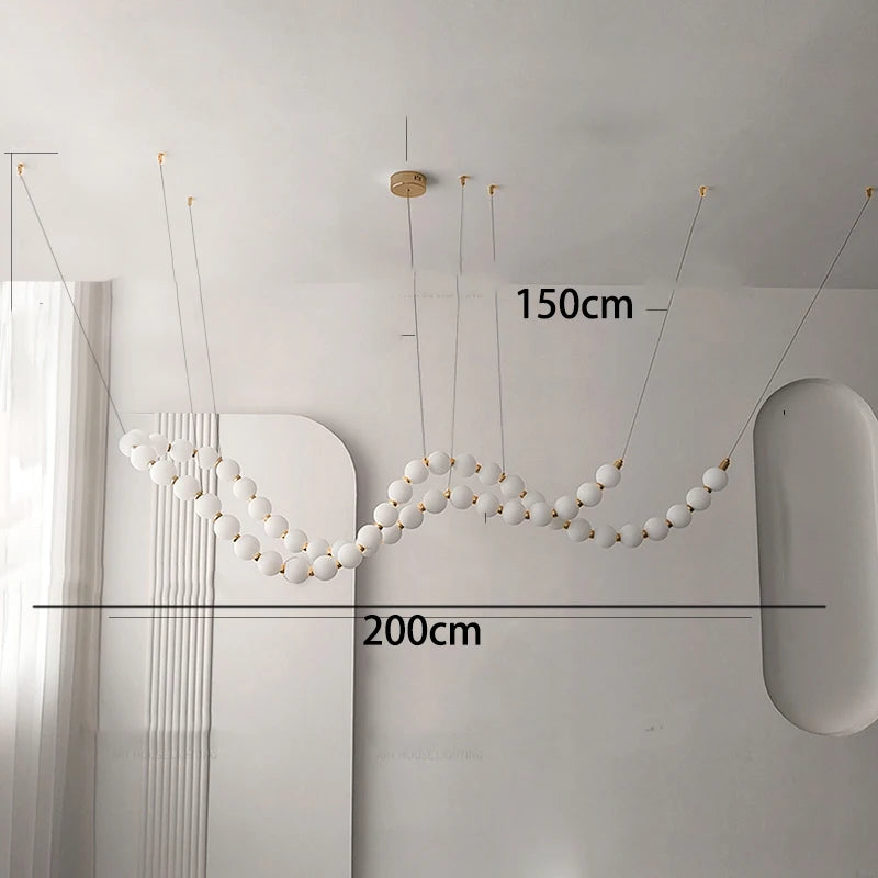 Acrylic diffuser detail on a minimalist linear strip chandelier