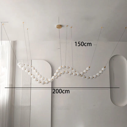 Acrylic diffuser detail on a minimalist linear strip chandelier
