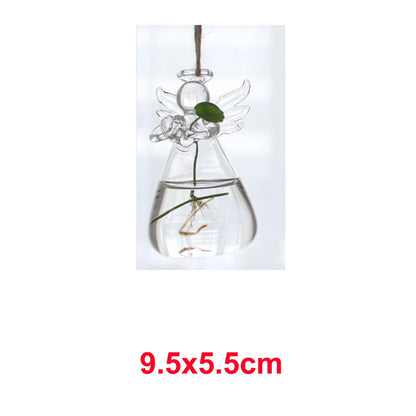 Angel glass hanging vase with hydroponic plant cutting displayed near window
