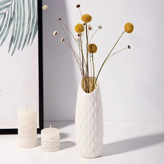 Color 1 minimalist plastic faux ceramic vase on Scandi desk with fresh flower