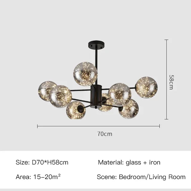 Gold Nordic chandelier with clustered glass globes and an iron canopy